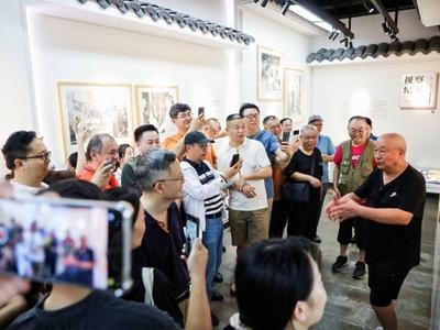 全国近百位新闻工作者实地探访“江南红巷”小营巷